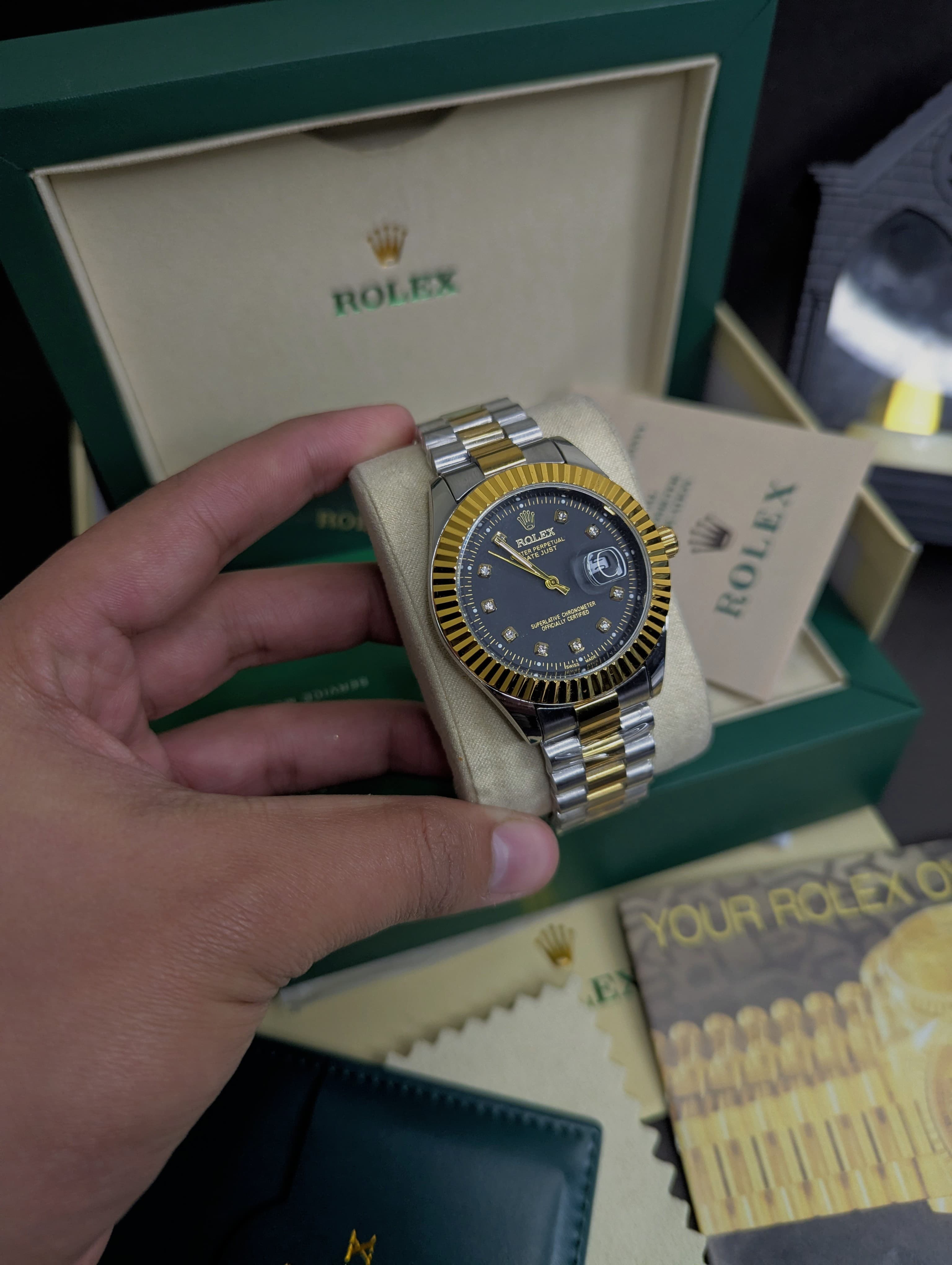 Rolex (black dial)